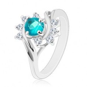 Lesklý prsten ve stříbrné barvě, modrý kulatý zirkon, čiré obloučky G06.06