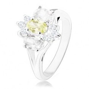 Blýskavý prsten ve stříbrném odstínu, rozdělená ramena, žluto-čirý květ R33.28