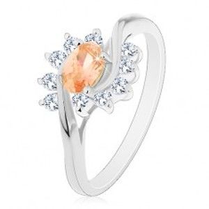 Prsten stříbrné barvy, světle oranžový zirkonový ovál, čiré oblouky AC18.07