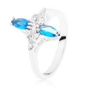 Prsten ve stříbrném odstínu, lesklá zvlněná ramena, modré a čiré zirkony R39.30