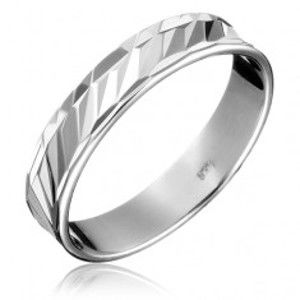 Stříbrný prsten 925 - diagonální prohlubně, členitý obvod H10.13