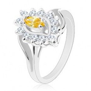 Třpytivý prsten ve stříbrném odstínu, žluté zrnko, čiré zirkonky AC15.03